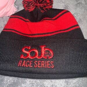 Pom-pom beanie with SoJo RACE SERIES embroidered on the cuff